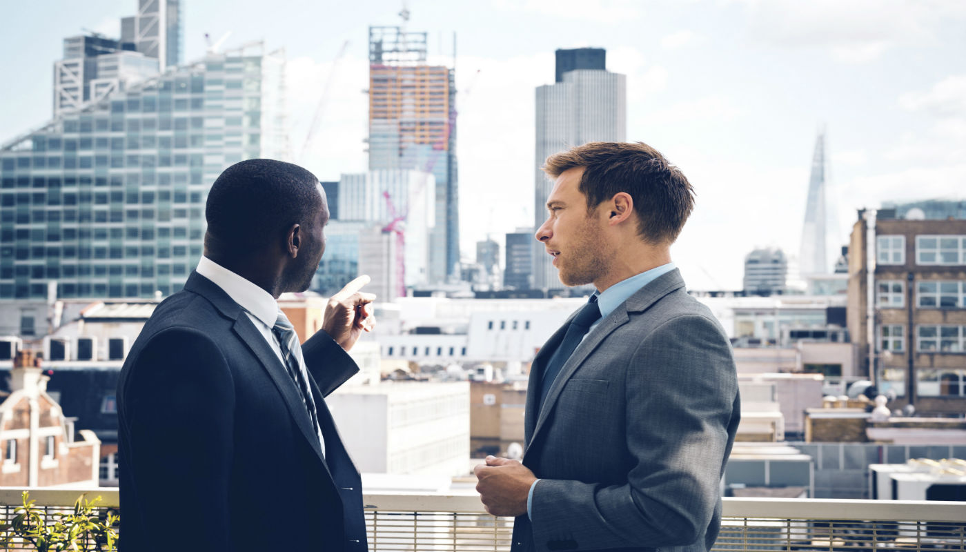 Two men in suits.