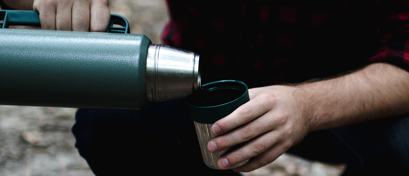 Pouring coffee from thermos