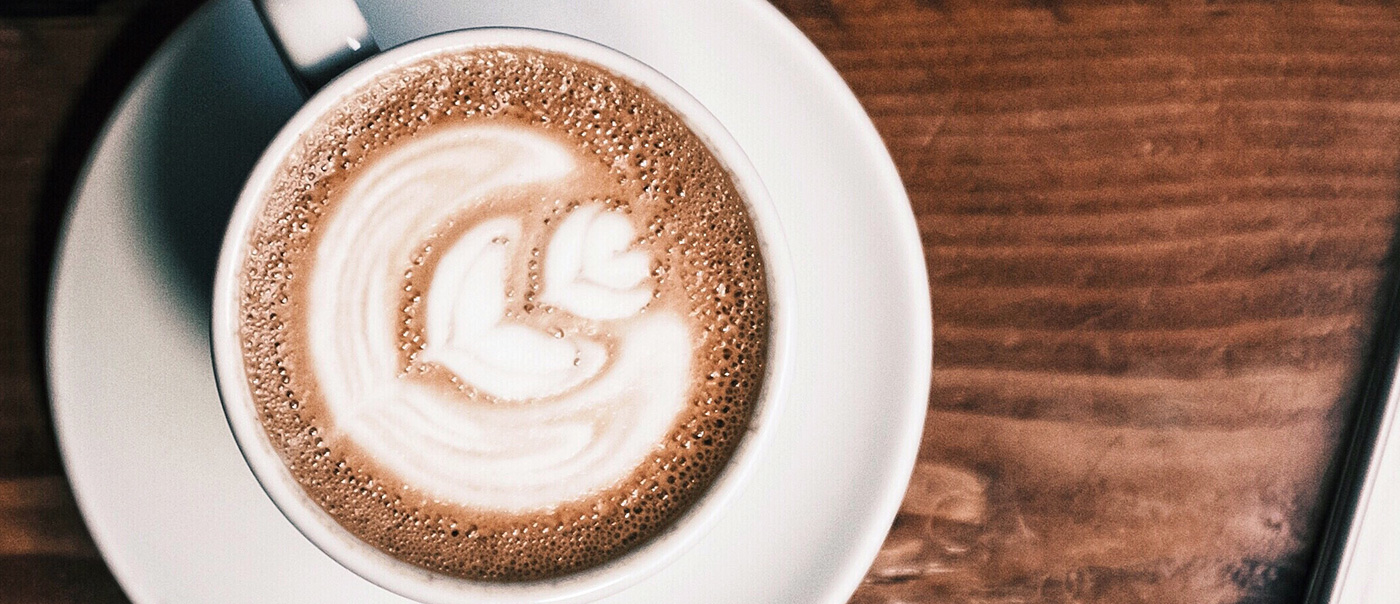 Latte on table with foam art