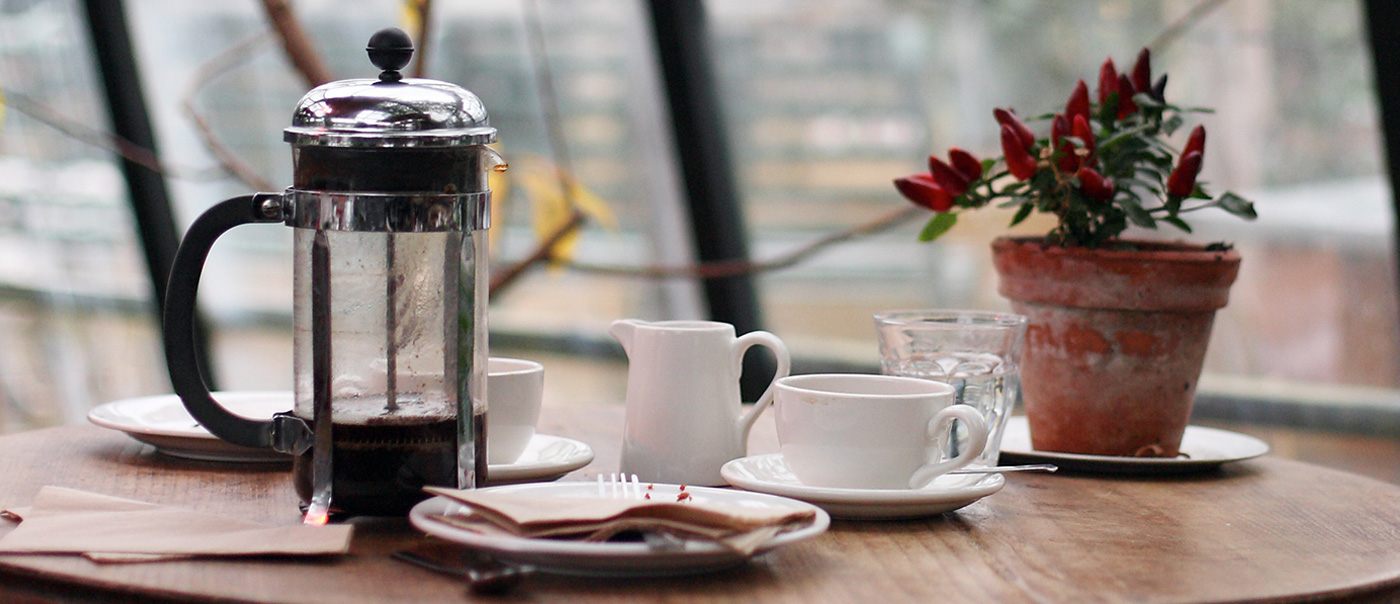 table setting with coffee carafe