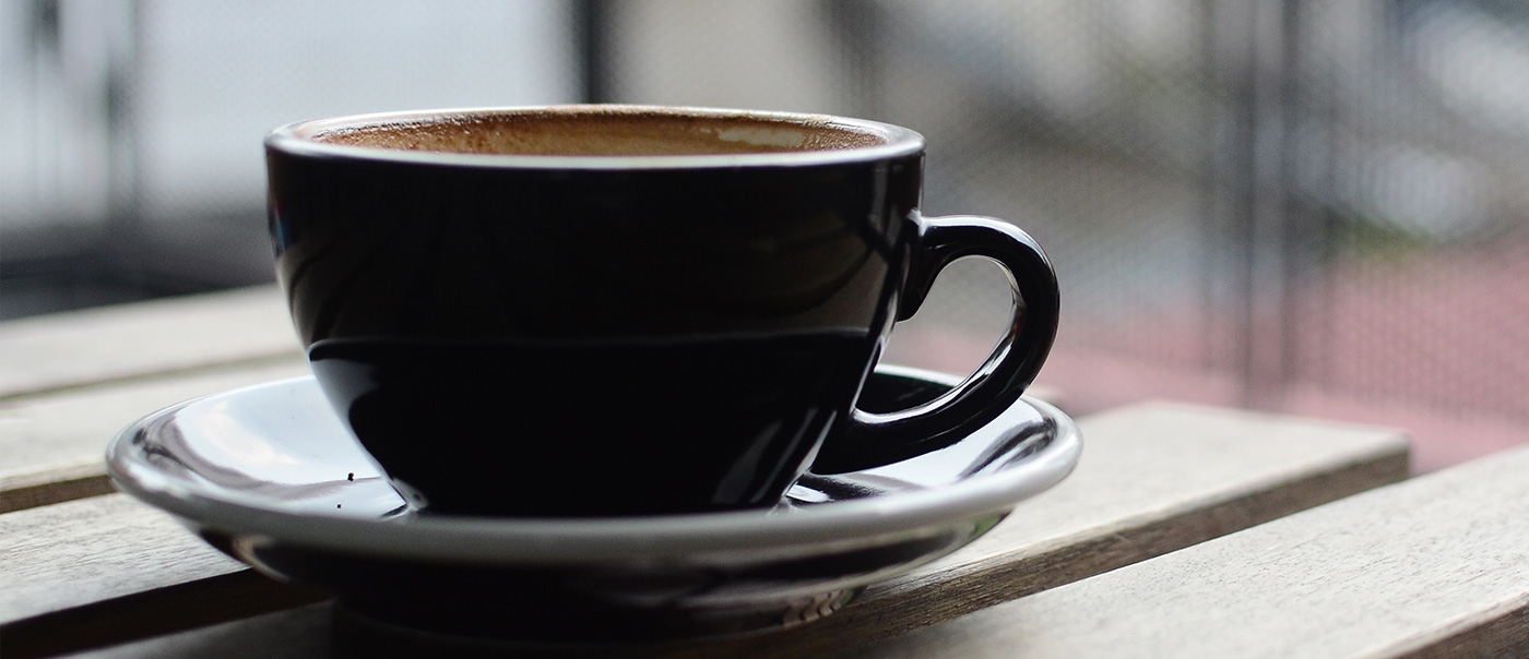 Cup of coffee resting in saucer