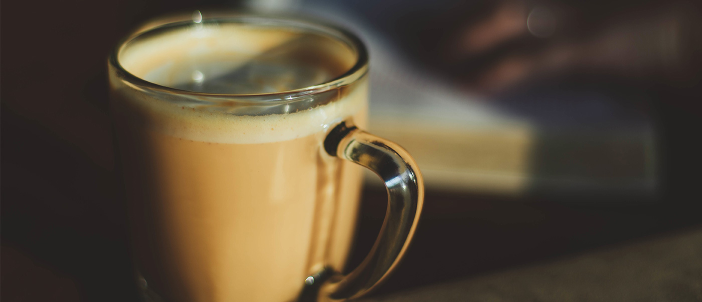 Cup of coffee on desk