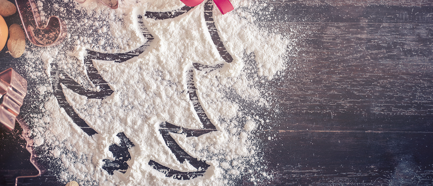 A layer of flour sits atop a table.