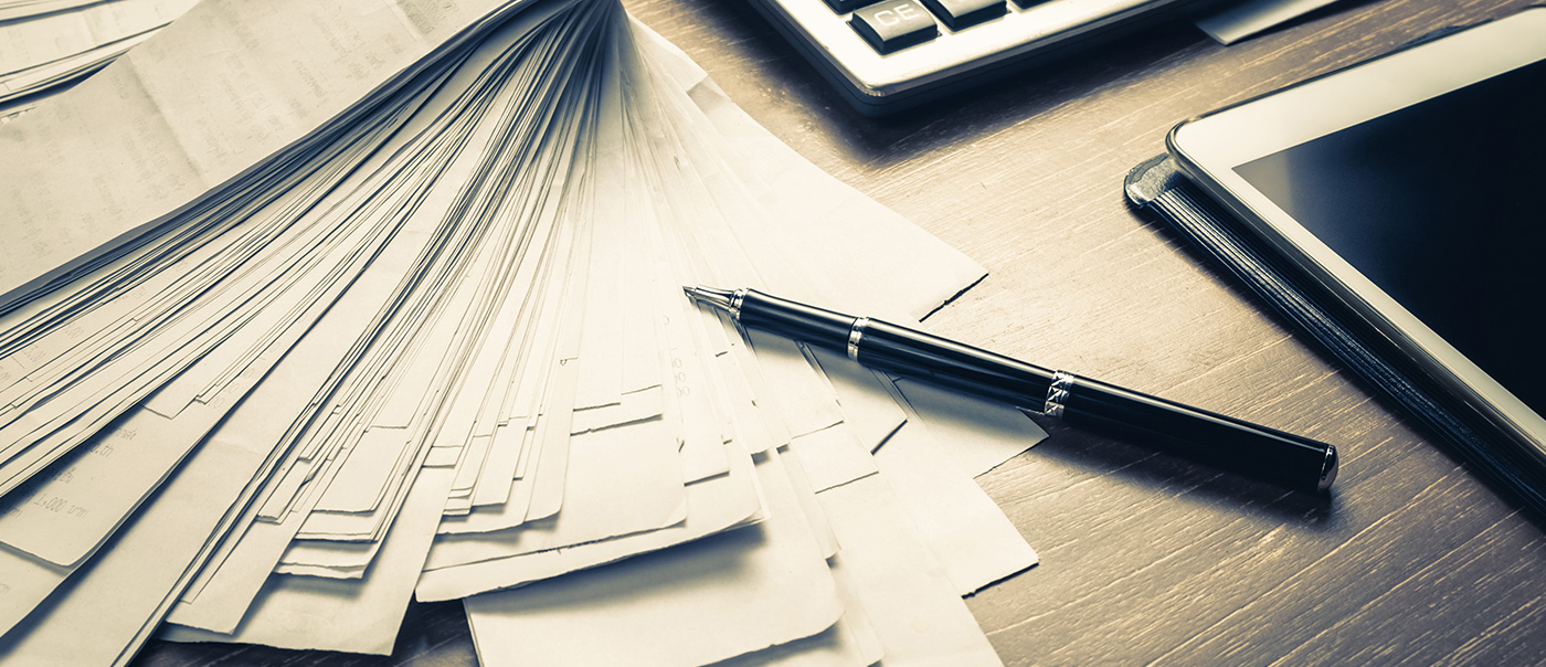 Papers on a table.