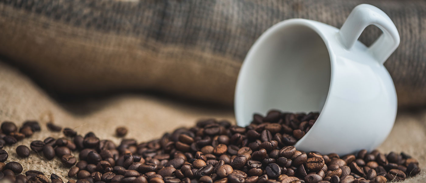 Coffee beans in a cup.