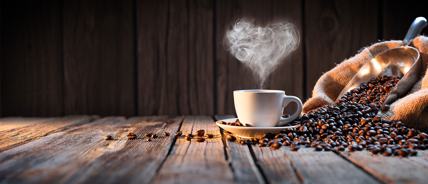 Heart atop of coffee.