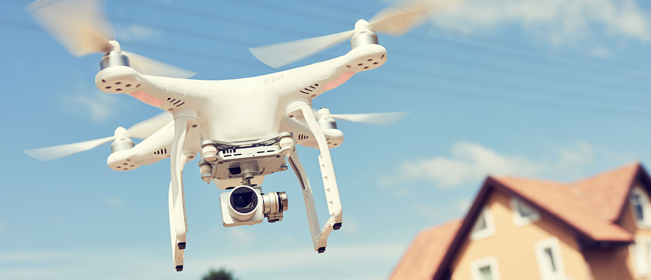 Drone flying over houses