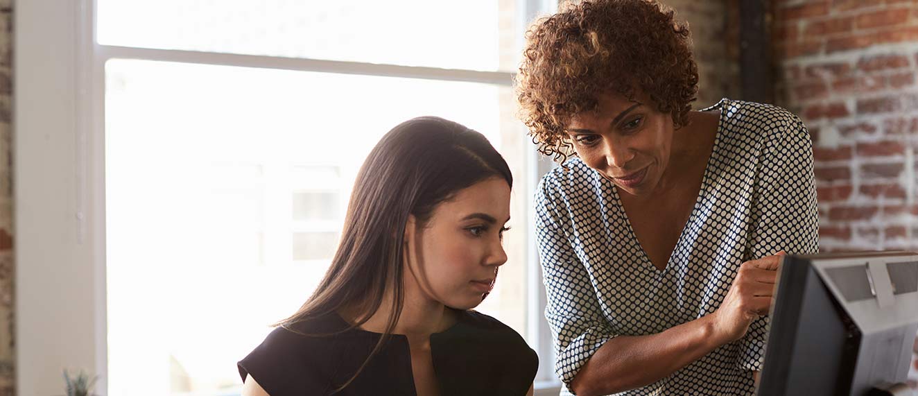 Two women working in an office