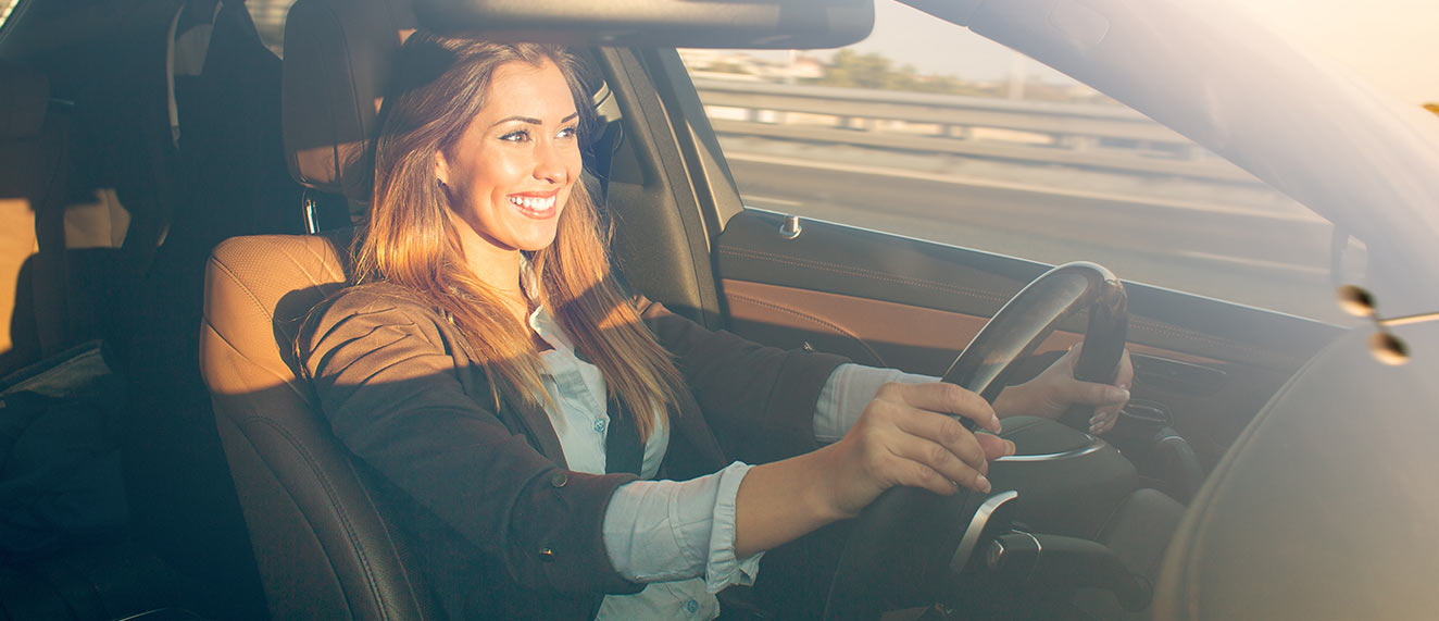 Woman driving in a car. 