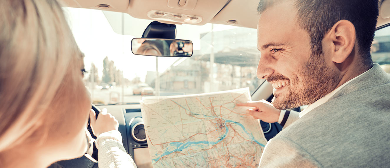 A couple reading a map.