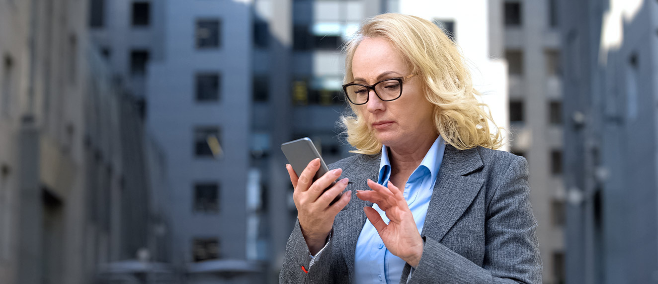 Woman looking at cell phone.