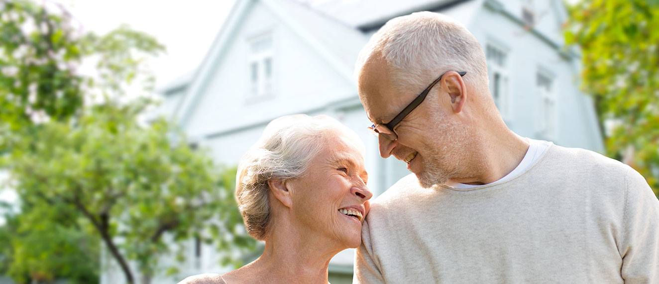 Senior couple looking happy.