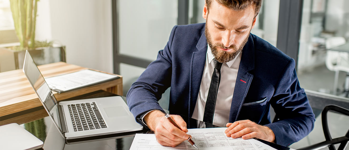 Man filling out legal documents