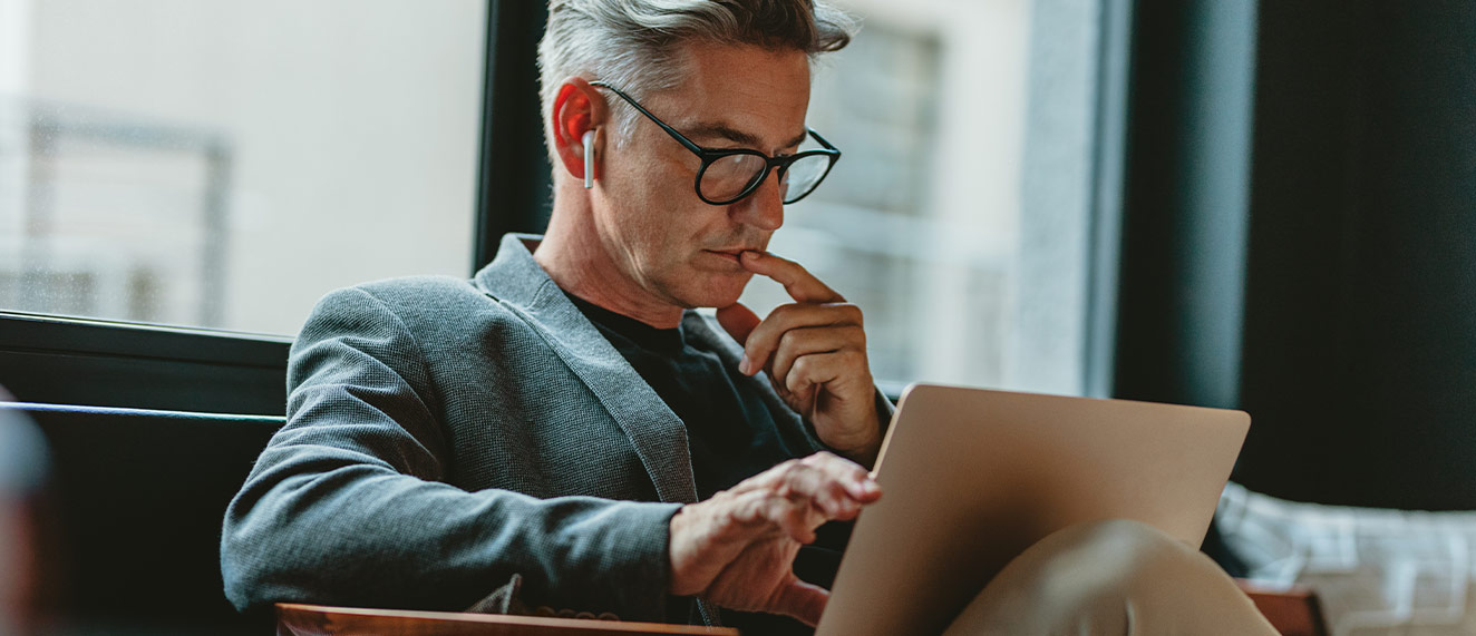 Man on computer.