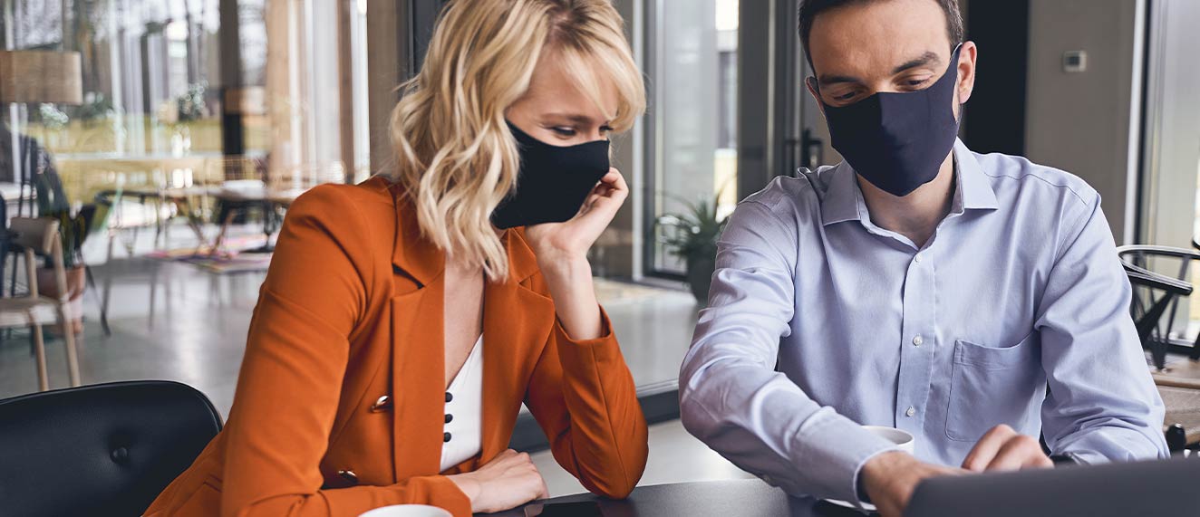 REALTORS(r) with face masks on.