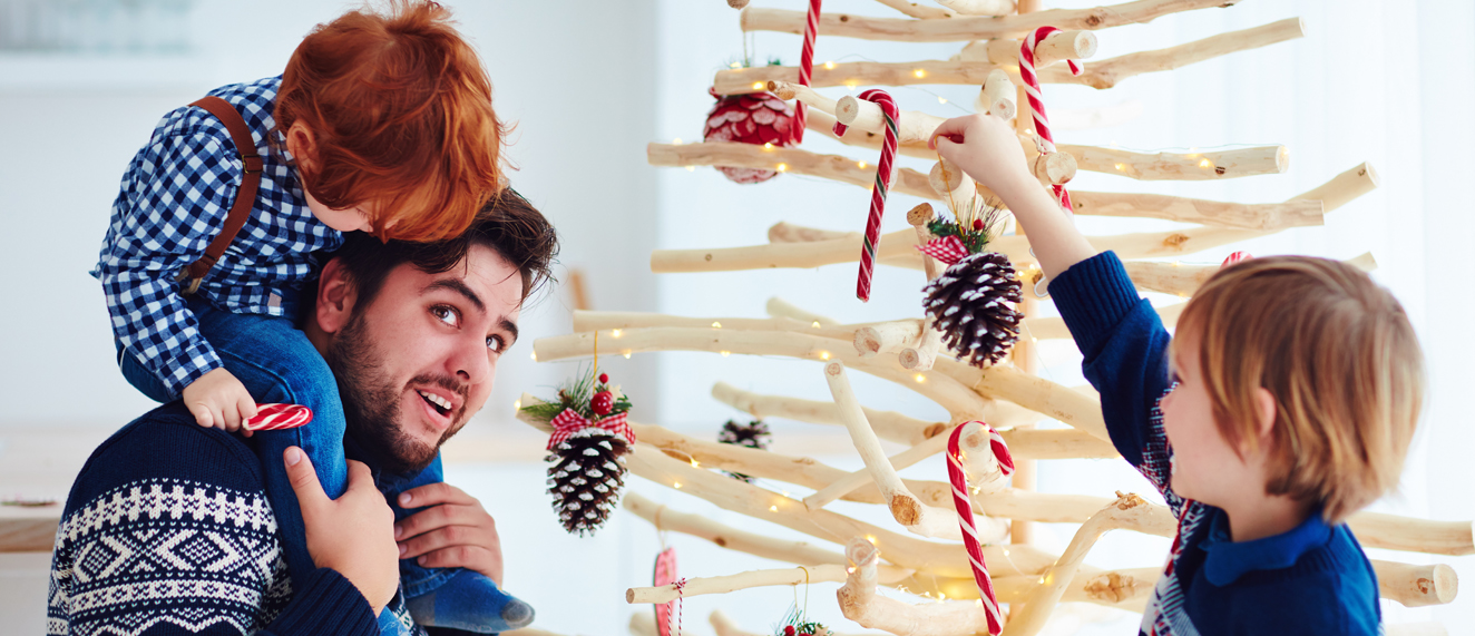 Hanging ornaments on a tree.