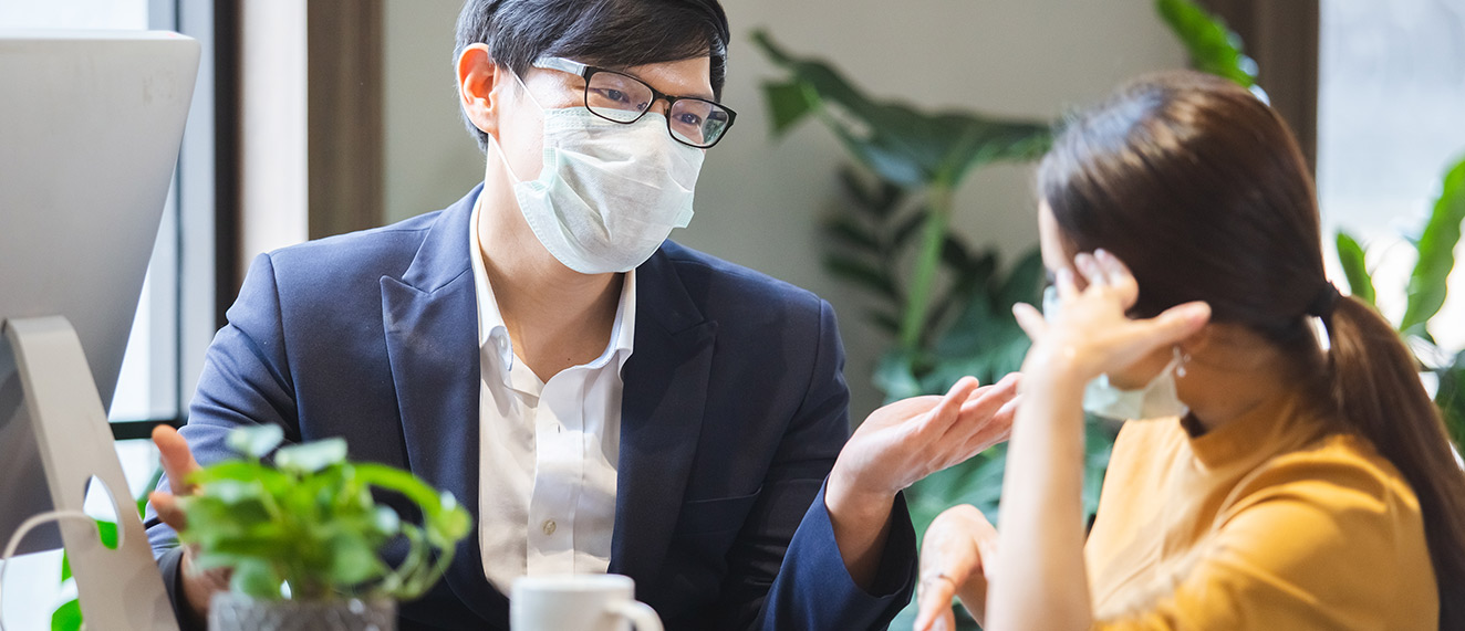 Coworkers in masks