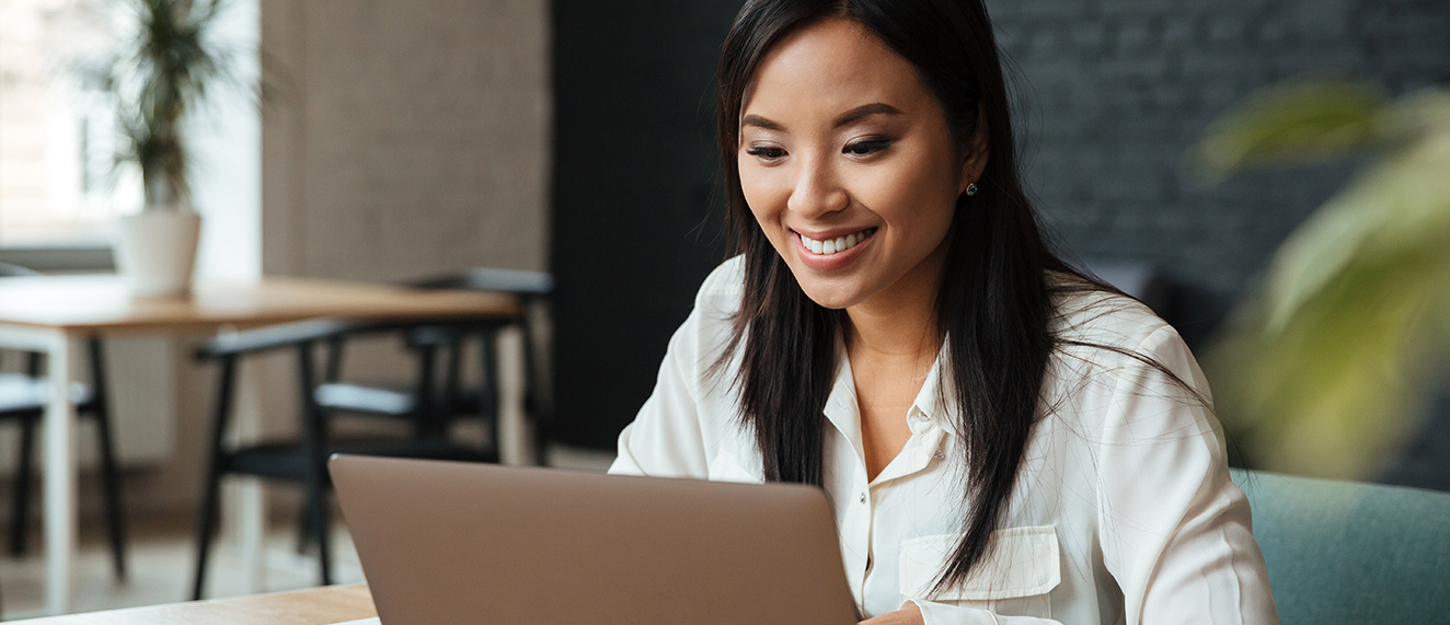 Woman editing her Google profile on laptop