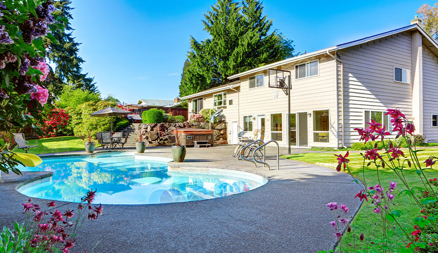 Beautiful backyard with swimming pool.