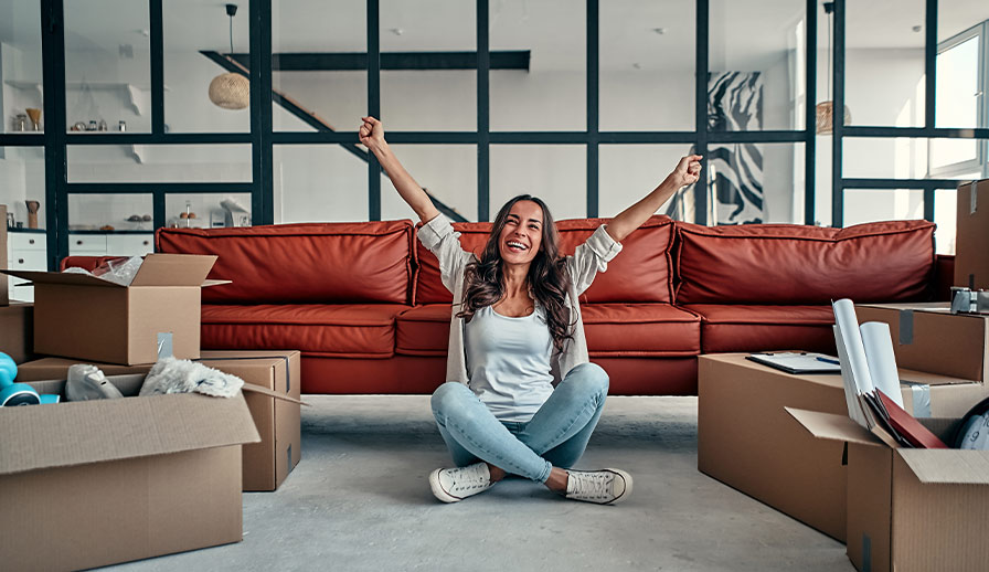 Woman moving in to apartment.