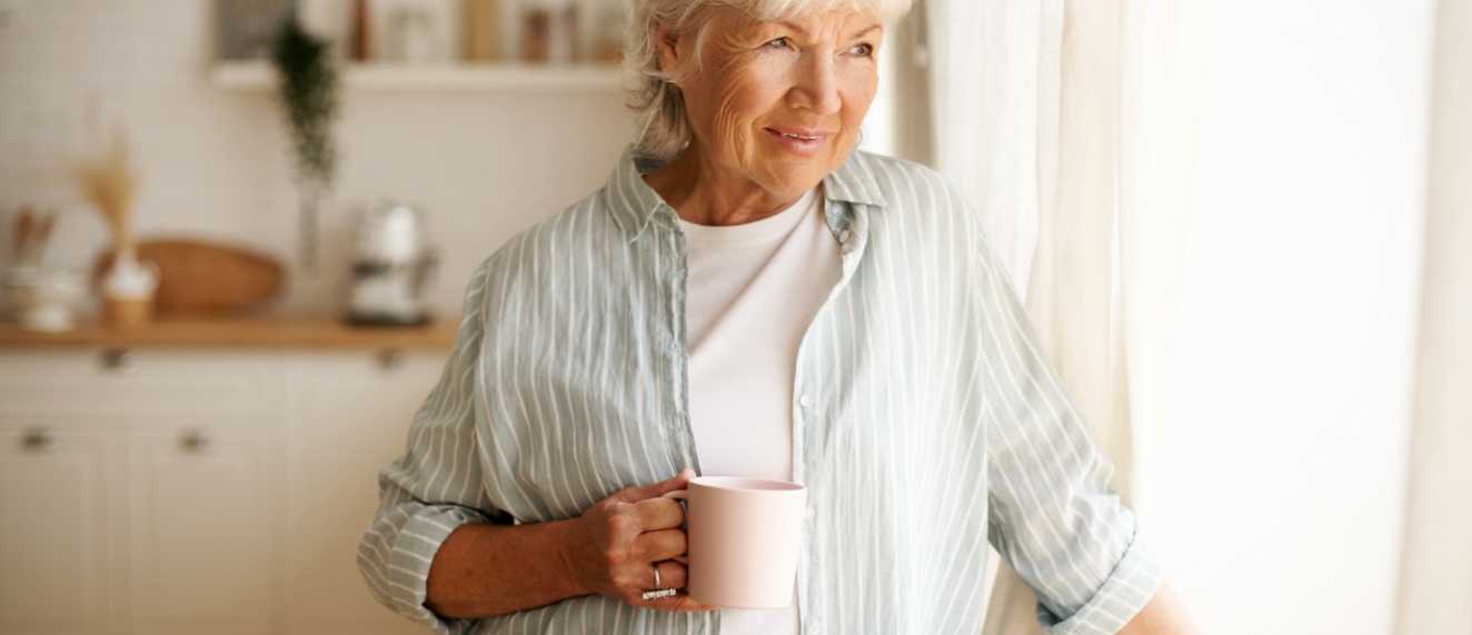 Senior enjoying coffee at home