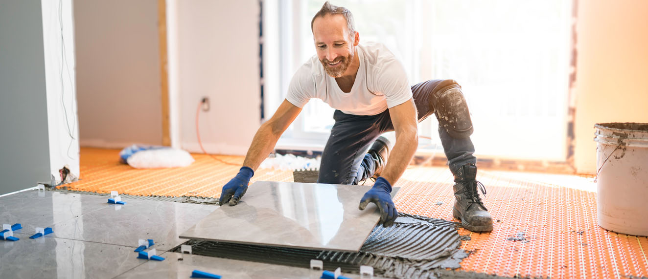 Contractor installing floor.