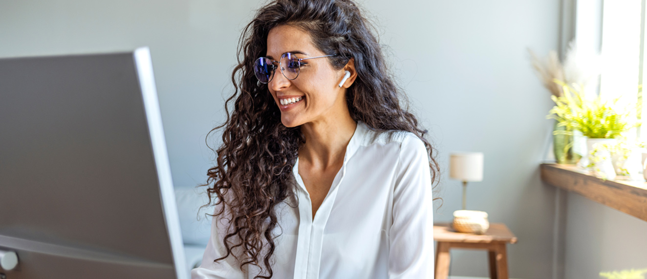 Woman working on computer.