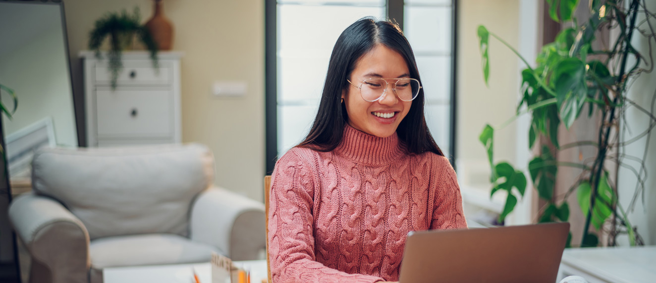 Woman googling real estate questions.