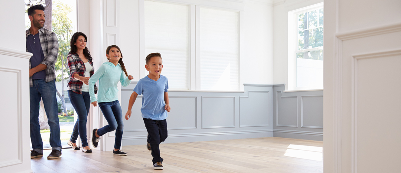 Family entering home.