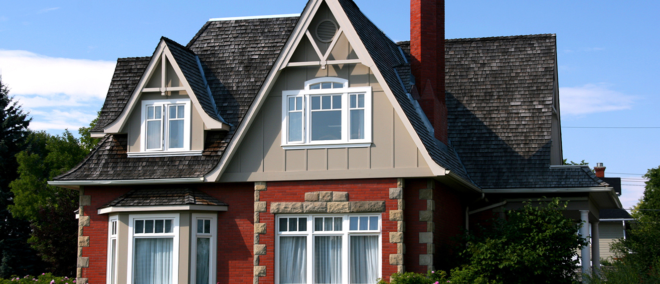 Red brick and grey house.