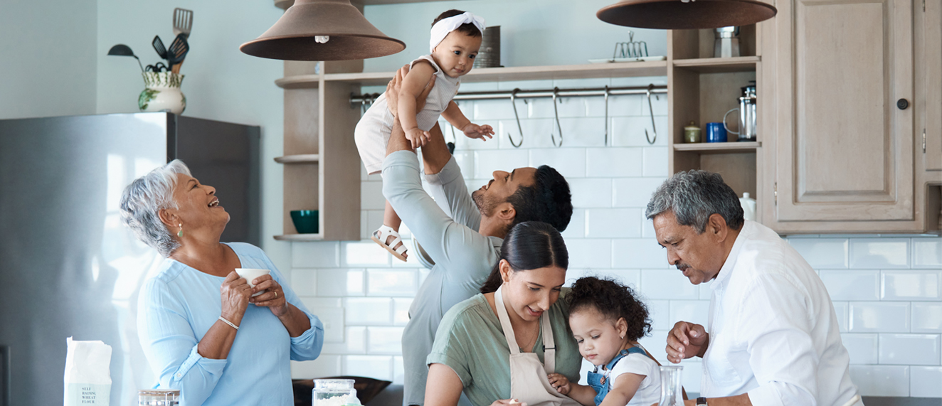 Multiple generations in a kitchen.