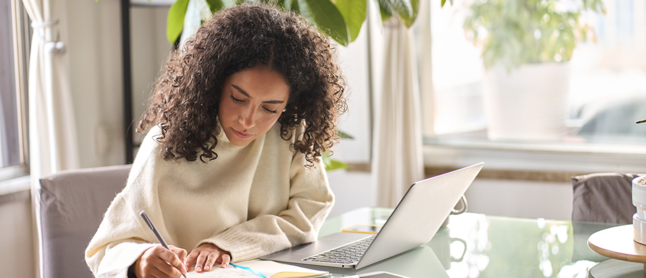 Woman studying course on computer.