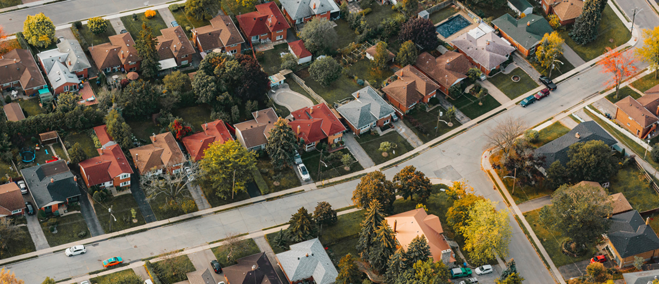 Aerial shot of suburban neighbourhood in the autumn.