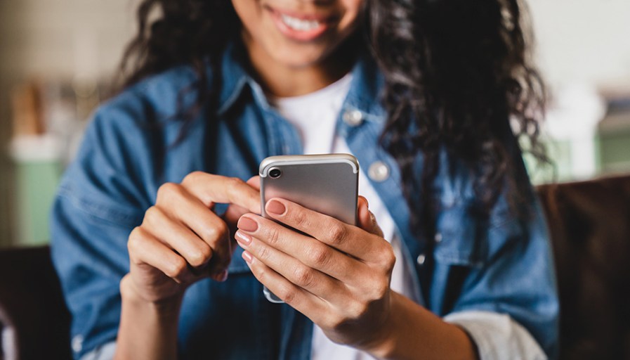 Woman looking at phone.