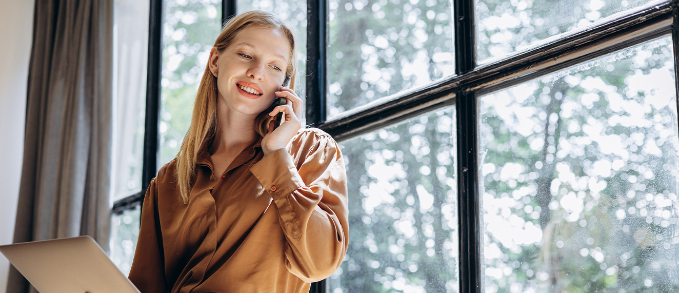 Woman on the phone in a window