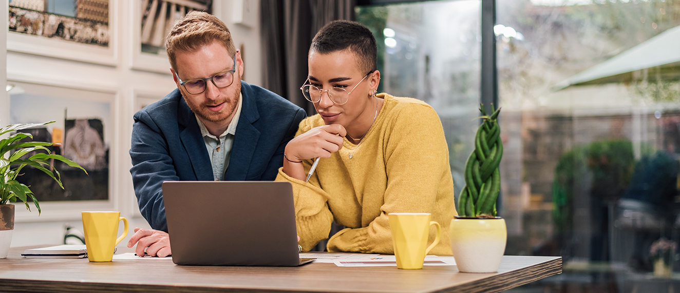 Couple looking at computer together