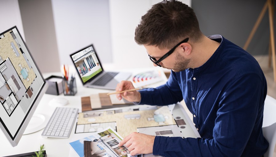 Man looking over papers. 