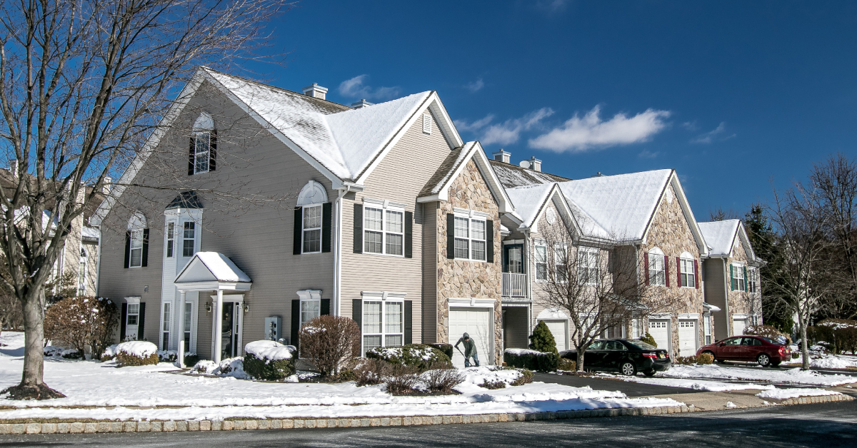 suburban houses covered in snow