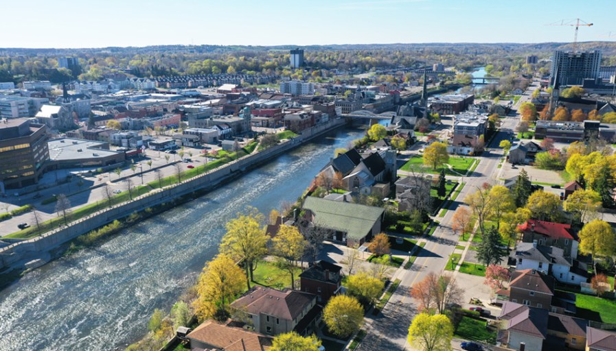 Overhead view of river and houses. 